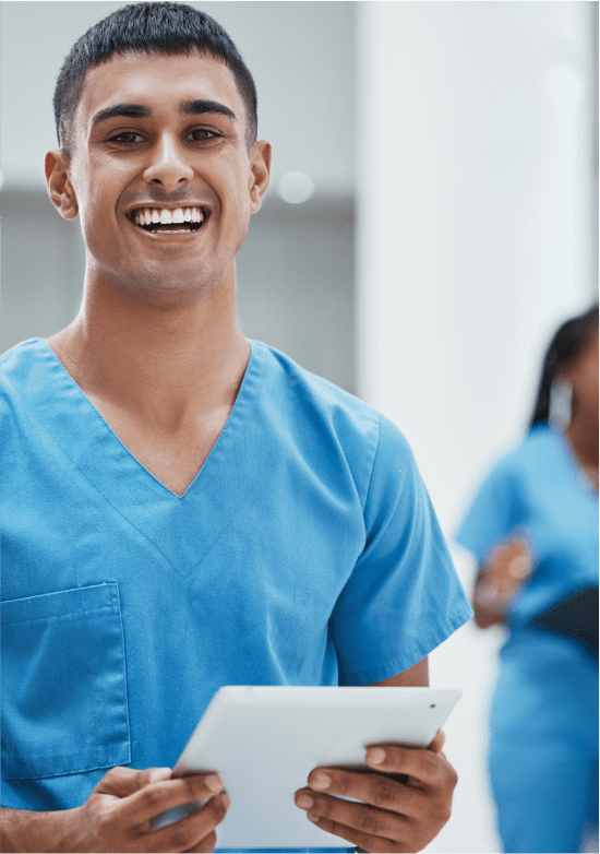 young doctor in blue uniform smiling